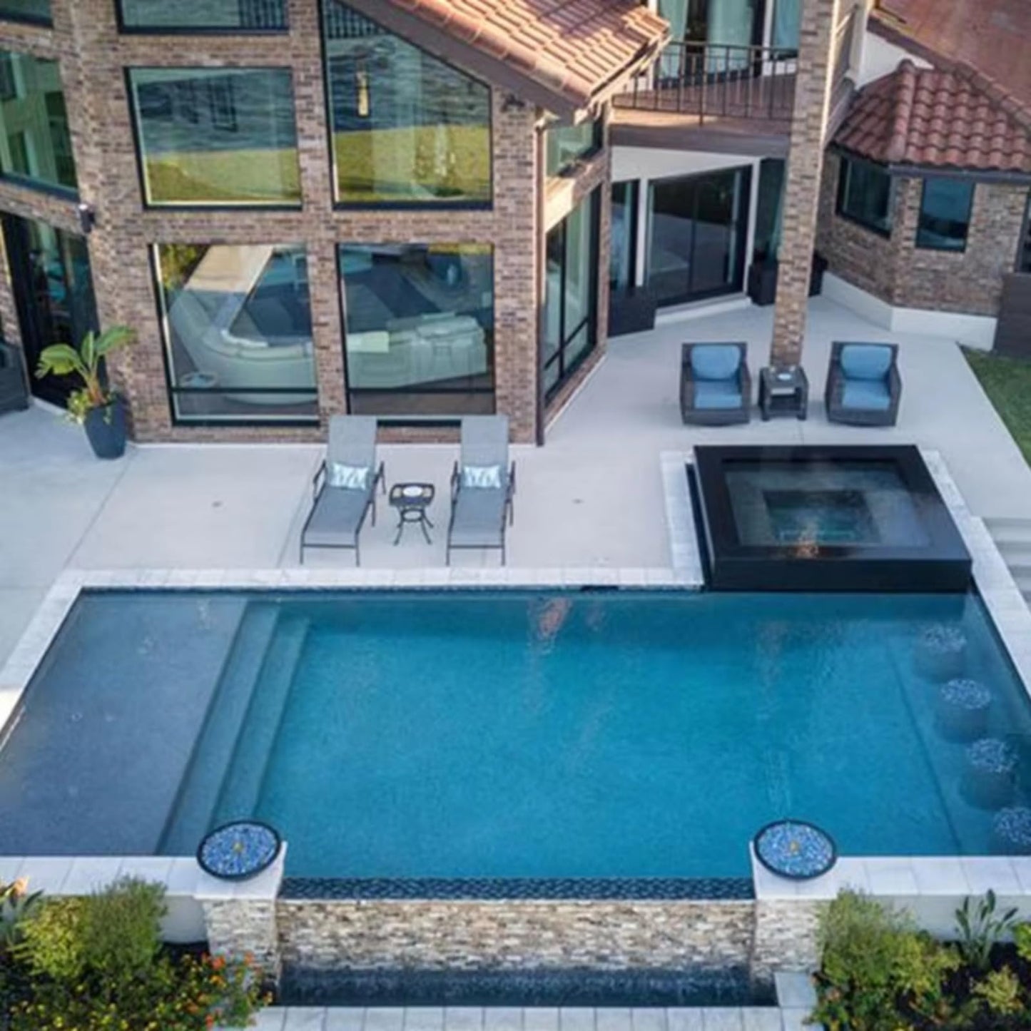 Modern luxury house with swimming pool, whirlpool, artificial turf & covered terrace